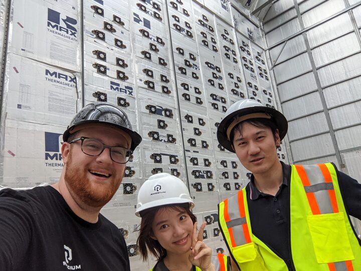 Aisles of liquid-cooled mining hardware at Rhodium's Texas site